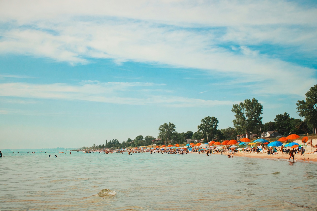 Busy sunny beach on Georgian Bay, Into the Flavor is based in Wasaga Beach, Ontario