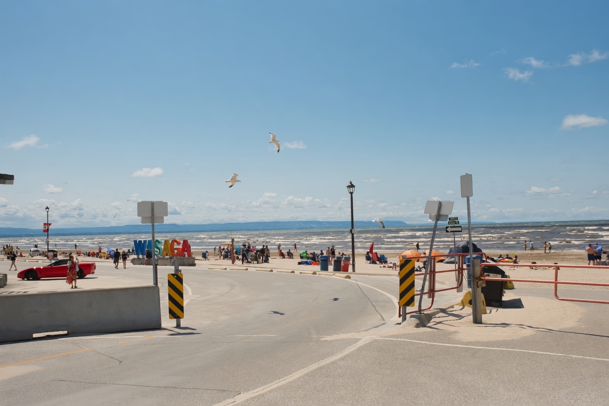 Wasaga Beach entrance and Georgian Bay shoreline on a busy summer day